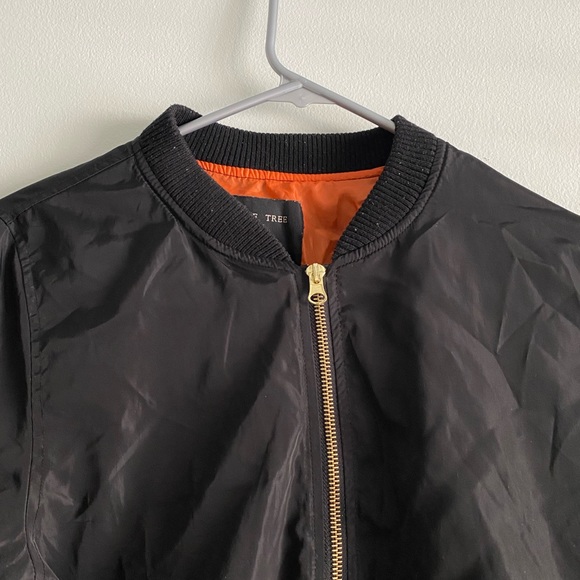 black bomber jacket, orange lining, gold zipper details - Picture 3 of 6